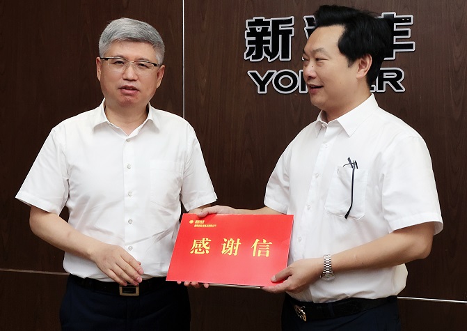 余先进一行到新洋丰石桥驿基地参观交流.jpg